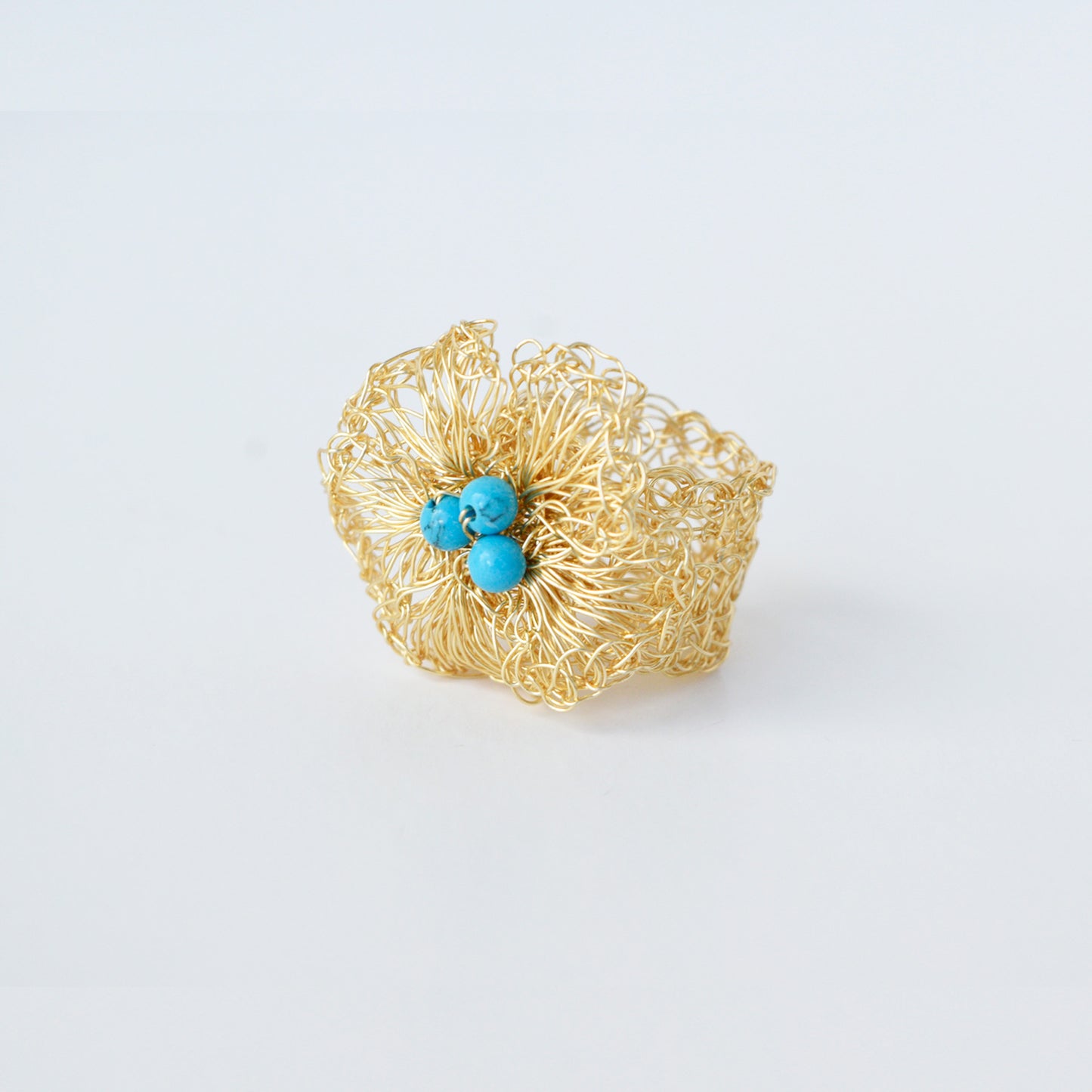 Anillo Flor Dorada con Turquesa